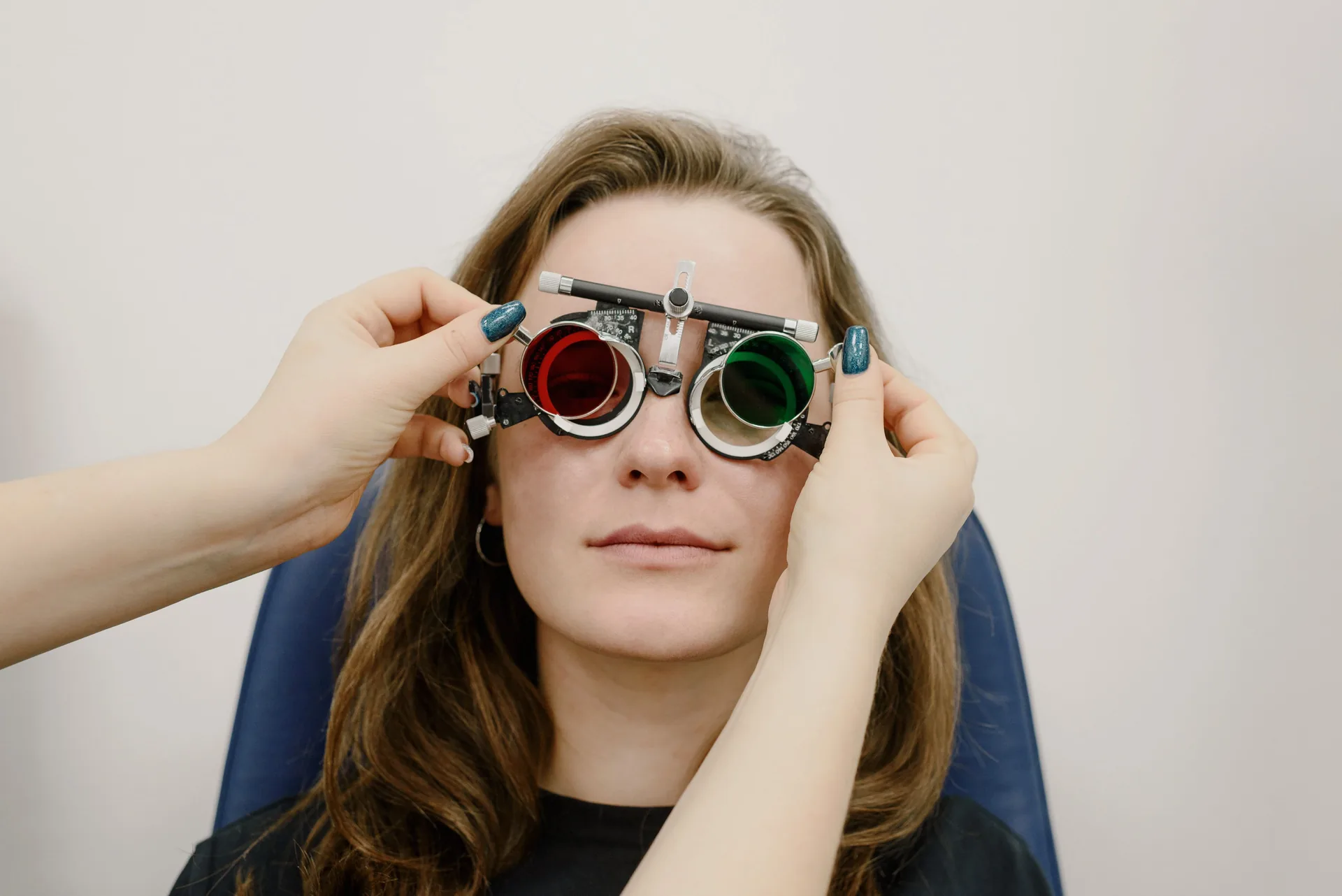 An adult patient during a comprehensive eye exam at Eye Story Optical in North York, Toronto.